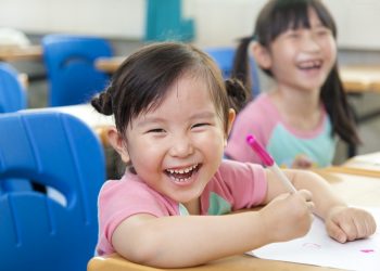 13550130 - happy little girls in the classroom